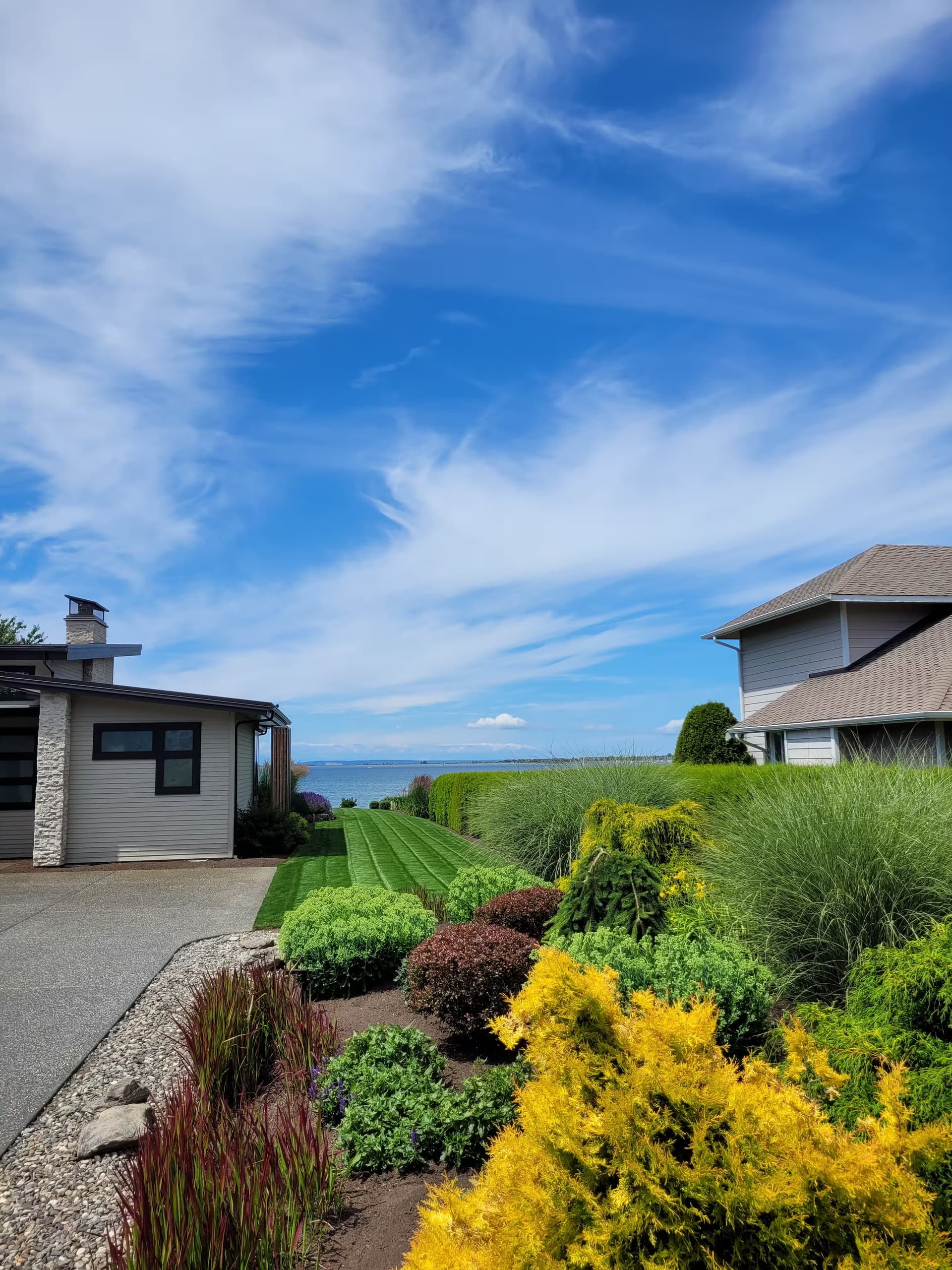 A landscaped garden and mown lawn
